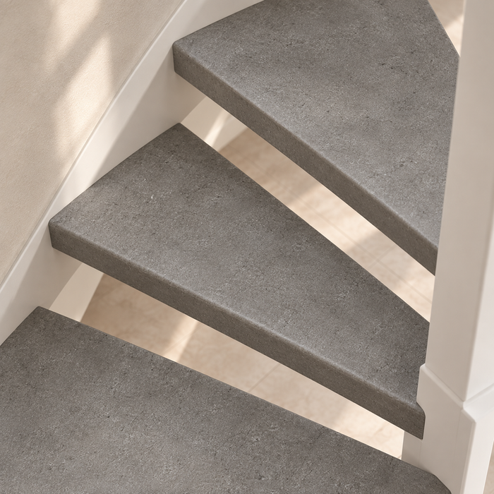 beton traprenovatie, open trap, detail van de draai
