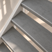 loft grijs traprenovatie, open trap, detail schuin van boven